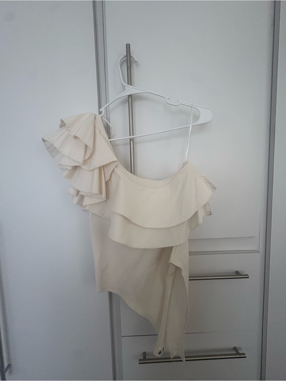 Asymmetric bodysuit with ruffle